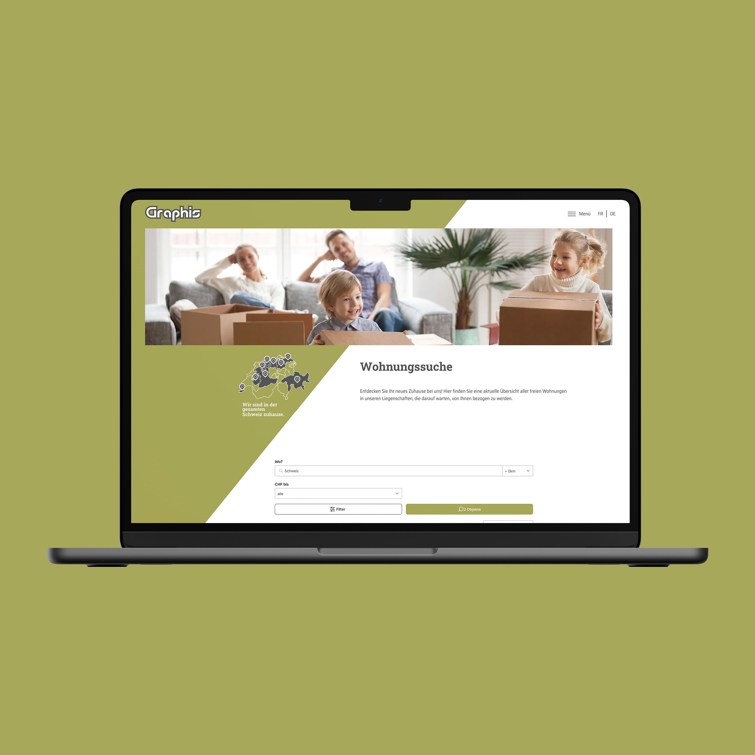 laptop mit der wohnungssuche auf der website von graphis vor olivgrünem grund